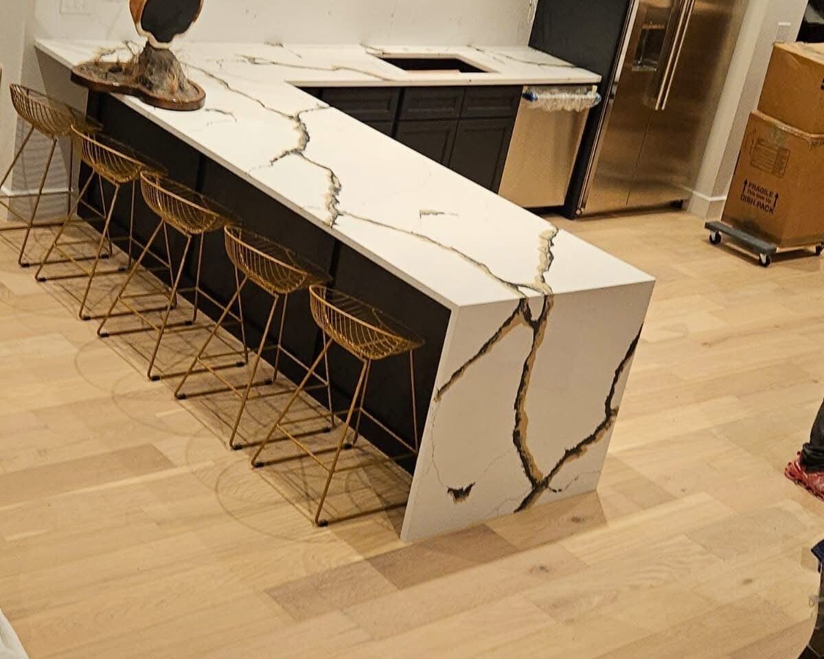 Remodeled kitchen with stone countertops